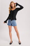 V-NECK RUFFLE TRIM RIBBED KNIT TOP