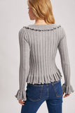 V-NECK RUFFLE TRIM RIBBED KNIT TOP