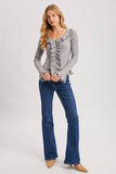 V-NECK RUFFLE TRIM RIBBED KNIT TOP