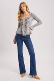 V-NECK RUFFLE TRIM RIBBED KNIT TOP