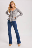 V-NECK RUFFLE TRIM RIBBED KNIT TOP