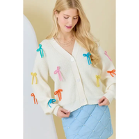 CREAM CARDIGAN WITH RIBBONS