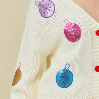 CREAM CARDIGAN WITH CHRISTMAS ORNAMENTS